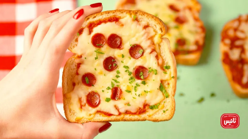 پیتزا خانگی با پنیر پیتزا کشسانی